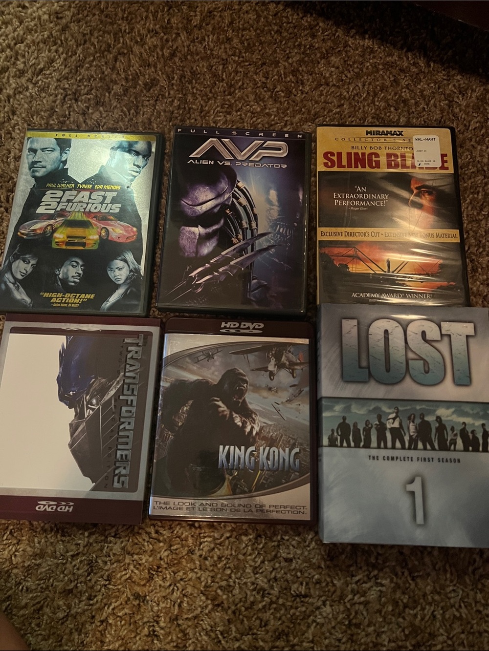 Five DVD’s and the complete set of the first season do Lost